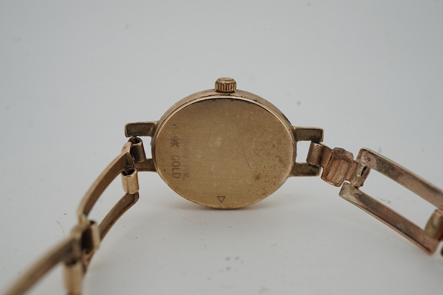 A lady's gold Rotary Elite quartz wrist watch, case width 1.6cm excluding winder, bracelet length 14.5cm, stamped 375 and 9K GOLD, European convention assay marks for 9ct gold, gross weight 12 grams